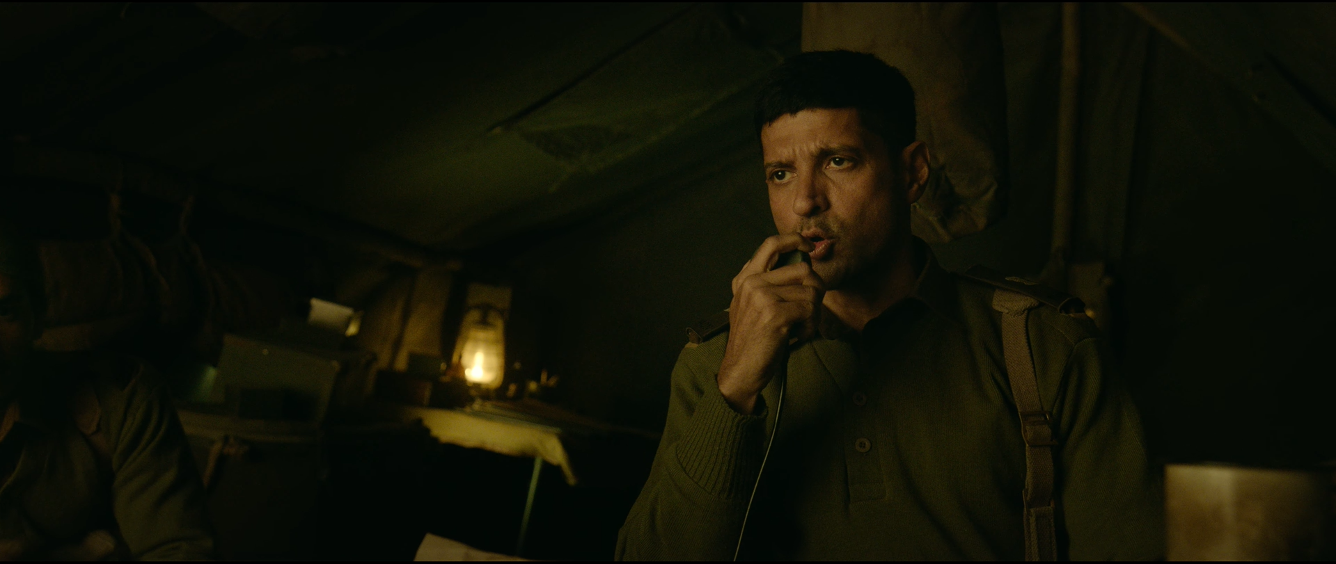 Soldiers talking on radio