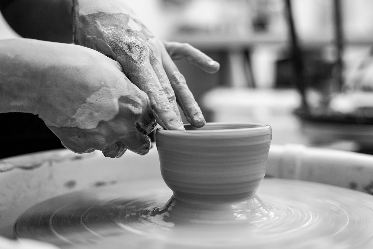 Tourist making pottery with their hand - TMM india