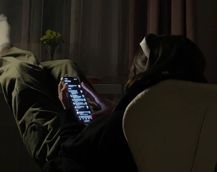 a person looking at phone