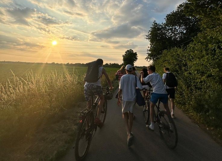 a group of friends cycling