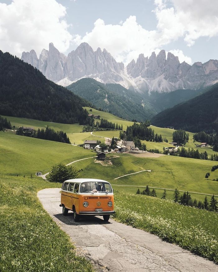 a caravan travelling through a valley