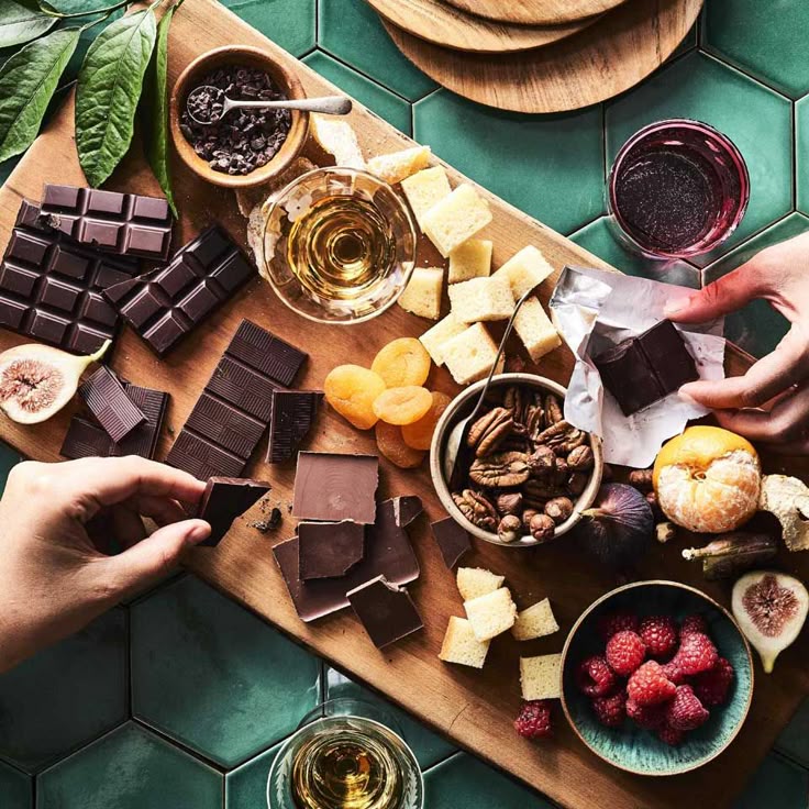 Different types of chocolates on a wooden board